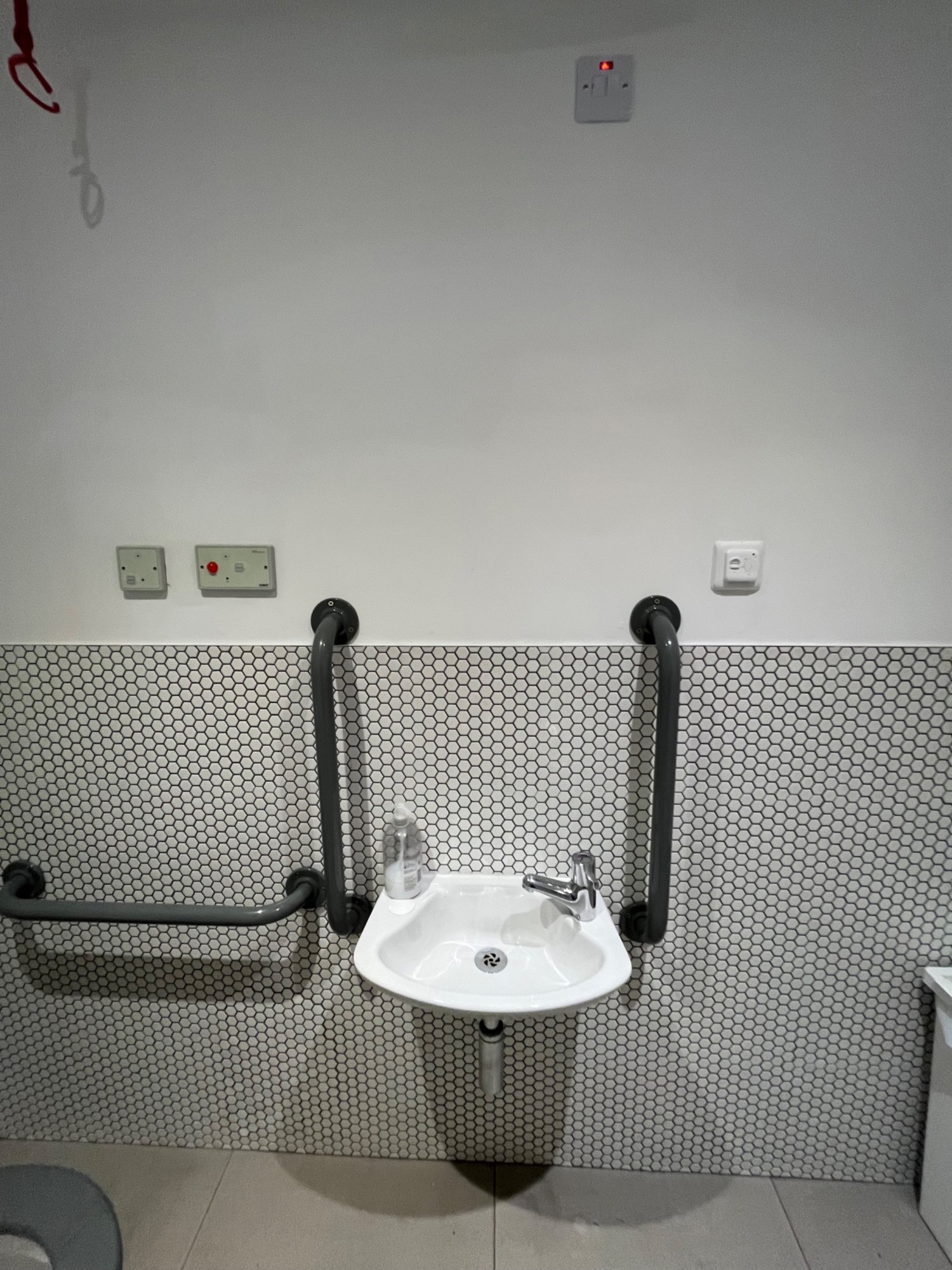 From door facing straight. Sink ahead.