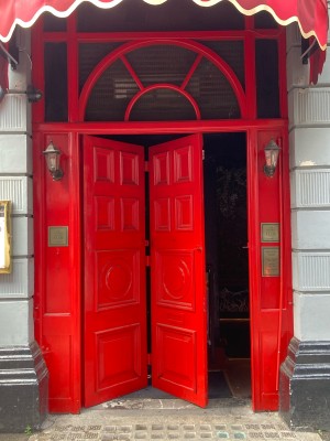 Access through red sliding wooden door. Slide left.