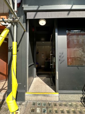 From pavement facing straight. Opening ahead.