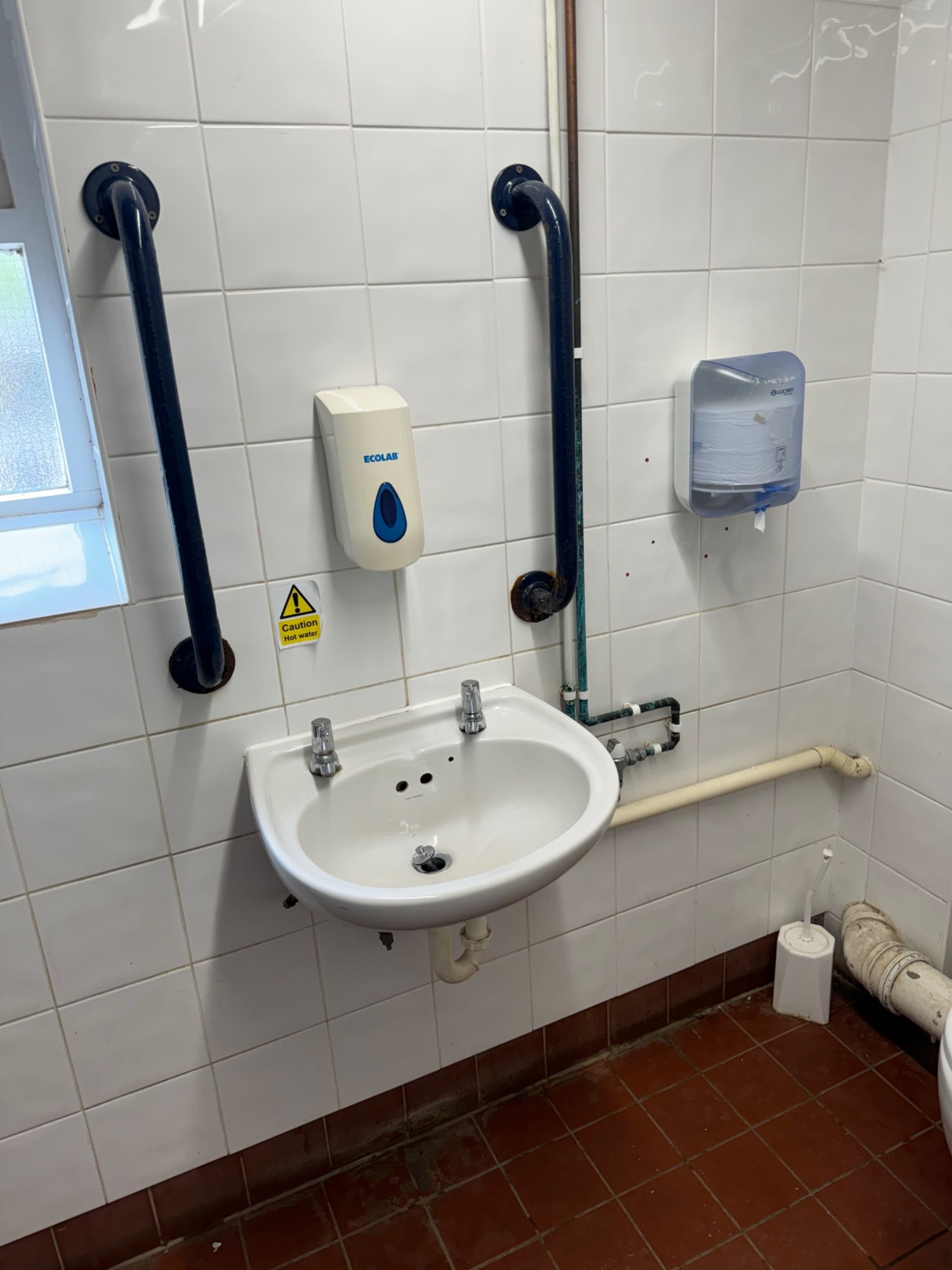 Wide sink not lower with soap just above tap grab rails both sides
