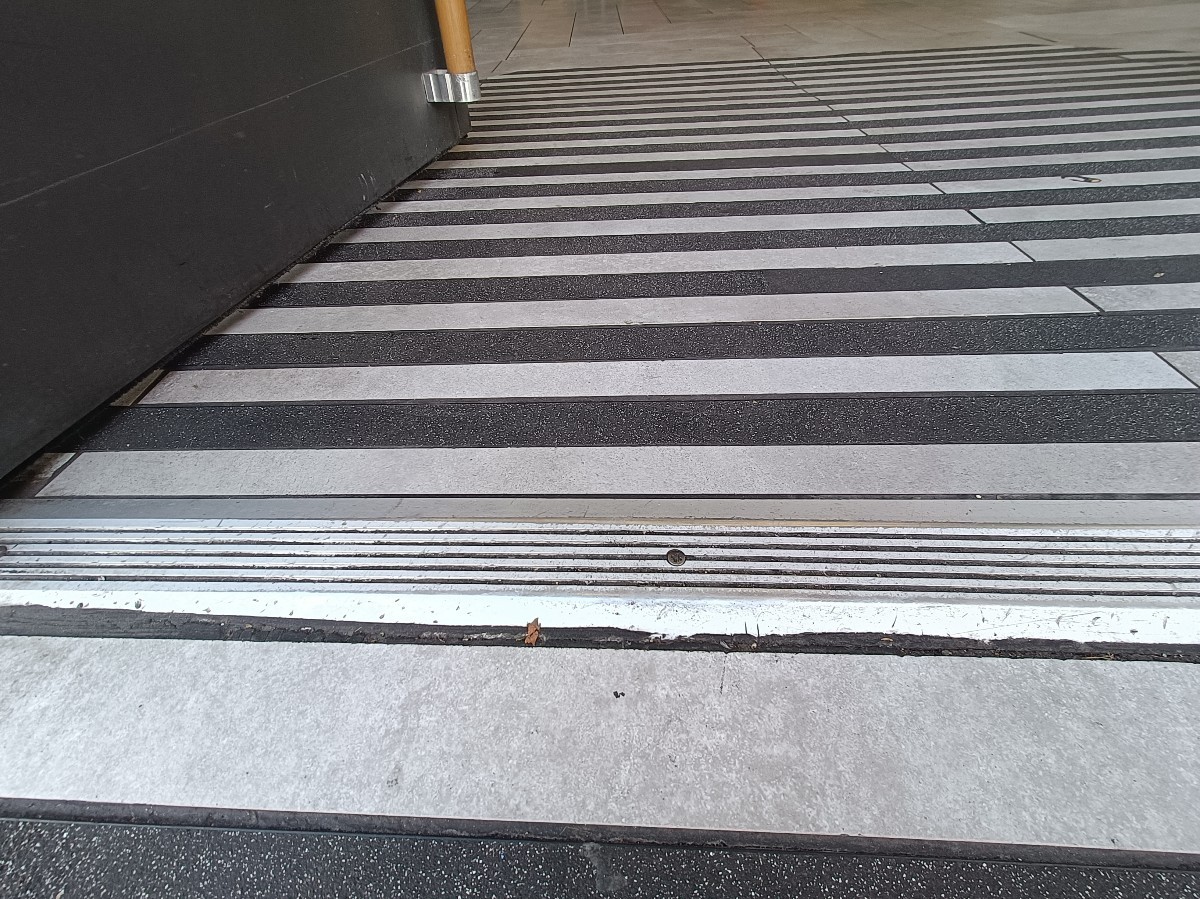 Small bump at threshold.