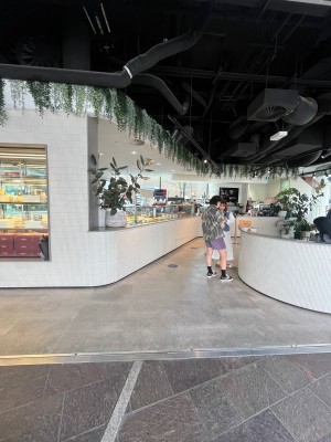 Open archway leading to path to service counter.