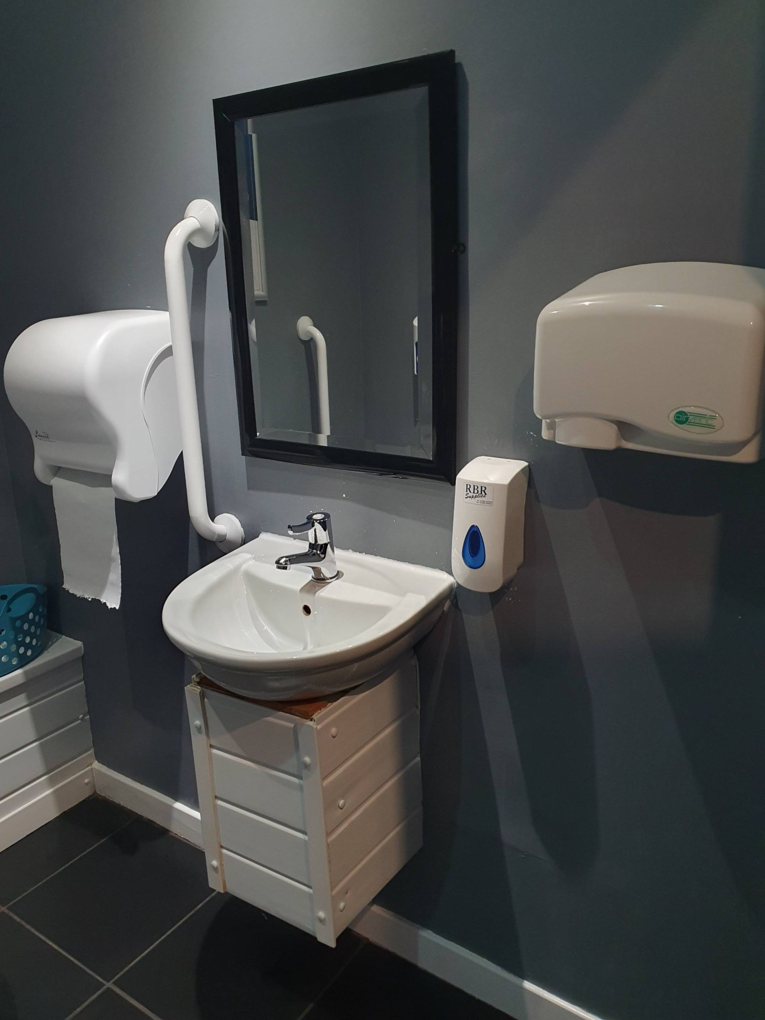 Sink, hand towels and hand drier
