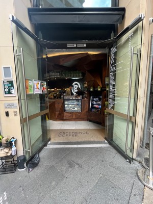 Glass double doors. Pull from middle.