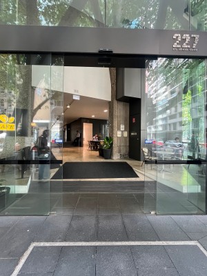 Glass double doors slide open automatically from middle. Doormat and built in ramp up after doors.
