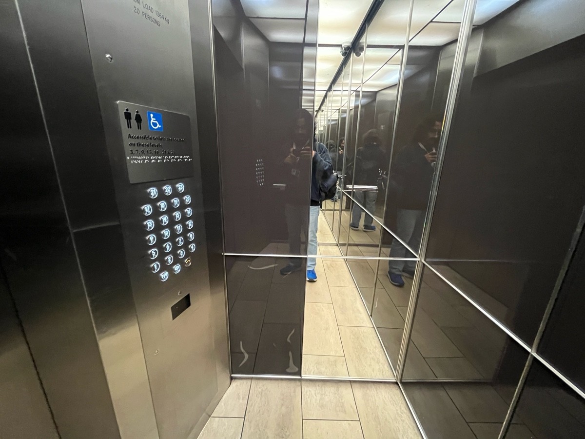 From lift doors facing left. Control panel ahead to left. Keycard scanner below control panel.