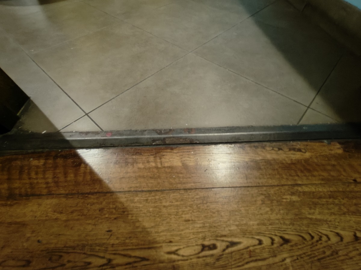Small bump on threshold of door.
