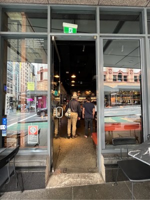 Glass door. Push from right.
