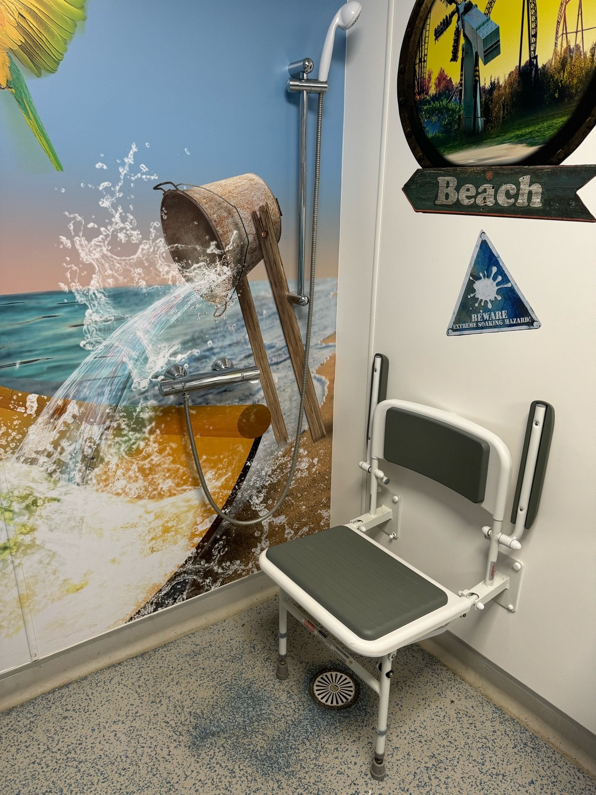 Handheld shower with shower seat