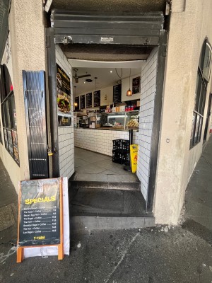 Open archway to venue from street.