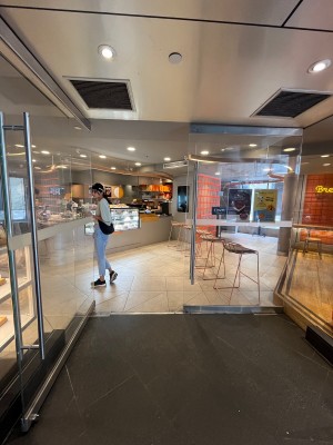 Glass double doors. Pull silver handles from middle.