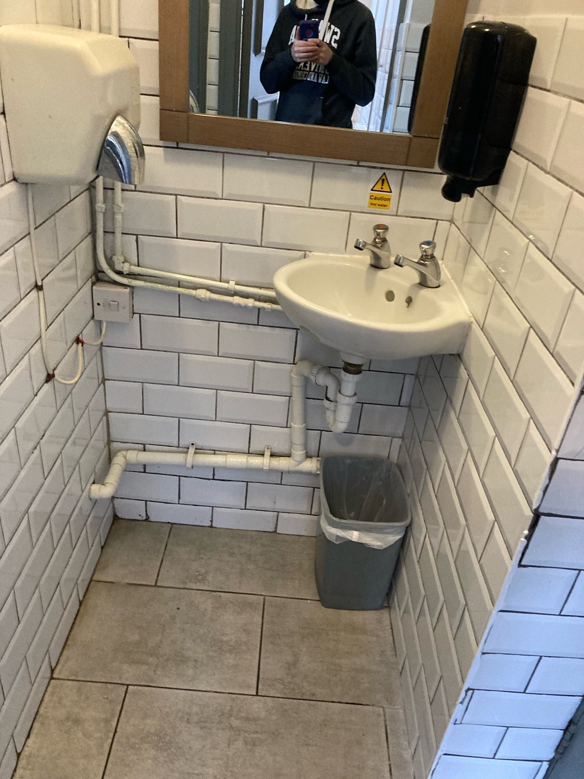 Standard height sink with bin underneath