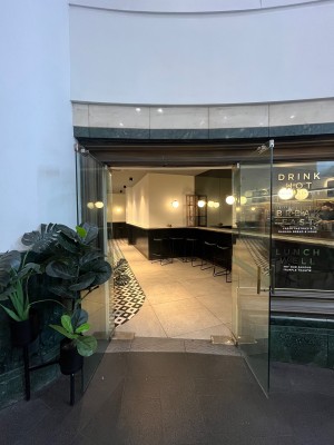 Glass double doors. Pull from middle.