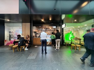 Open archway to kiosk counter from street. Small built in ramp up to counter.