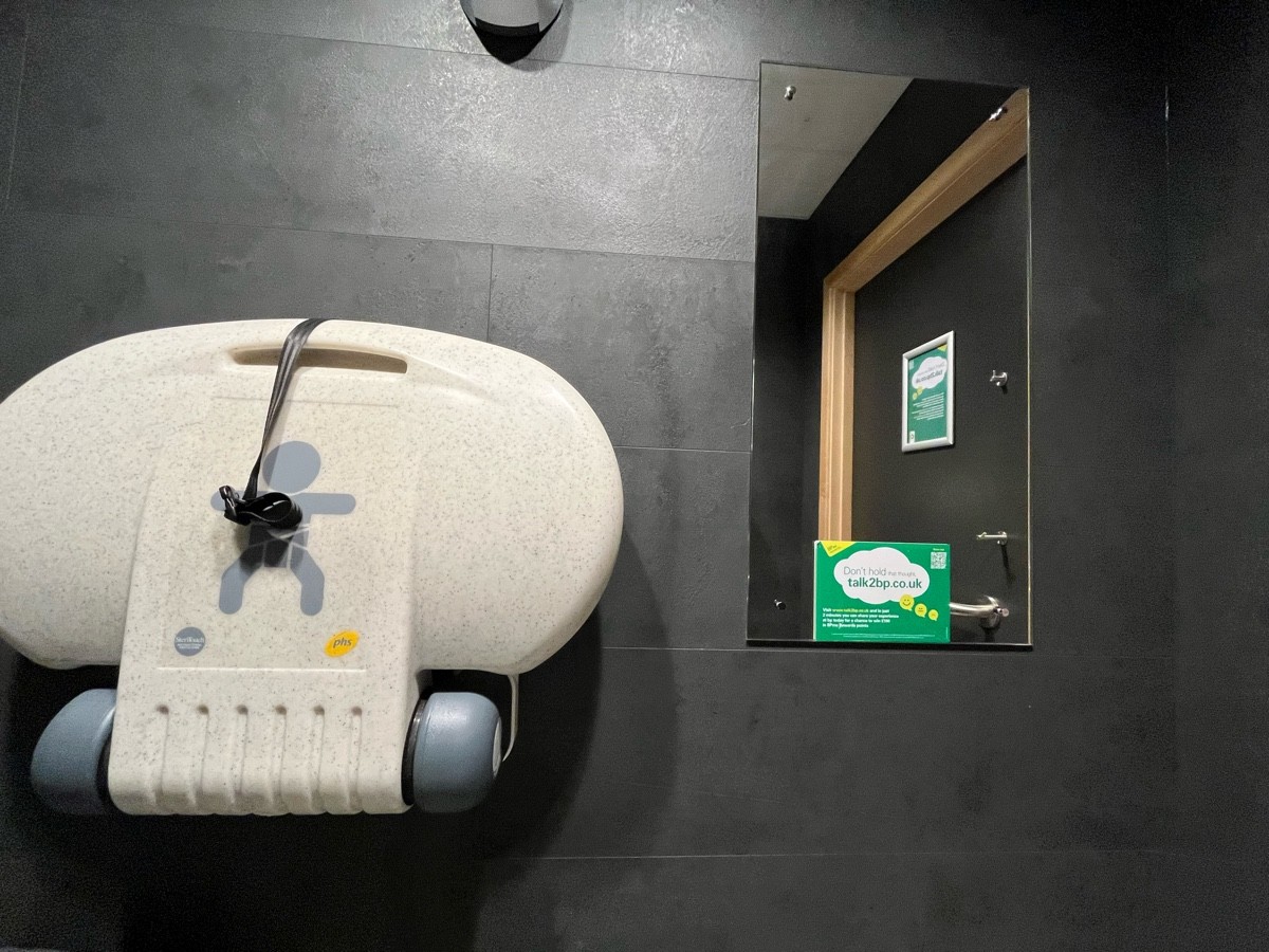 This shows a pull down baby change and a standing height mirror