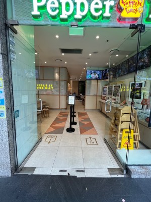 Glass double doors. Push from middle.