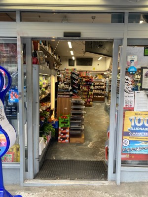 Glass doors ahead. Slide from center to open.