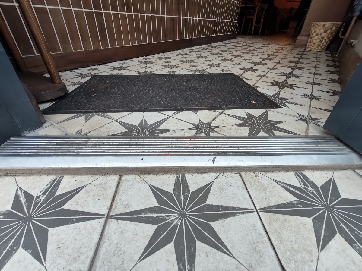 One small step on threshold of door.