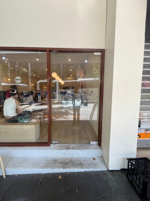 Glass door. Push from left to open.