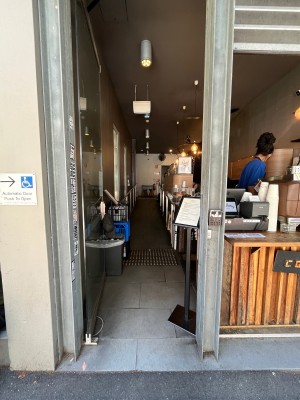 Glass door. Push from right.