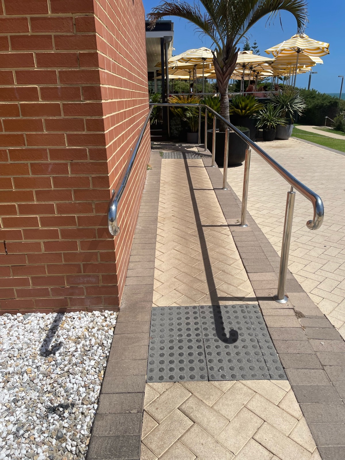 Tactile indicator in fron of ramp only