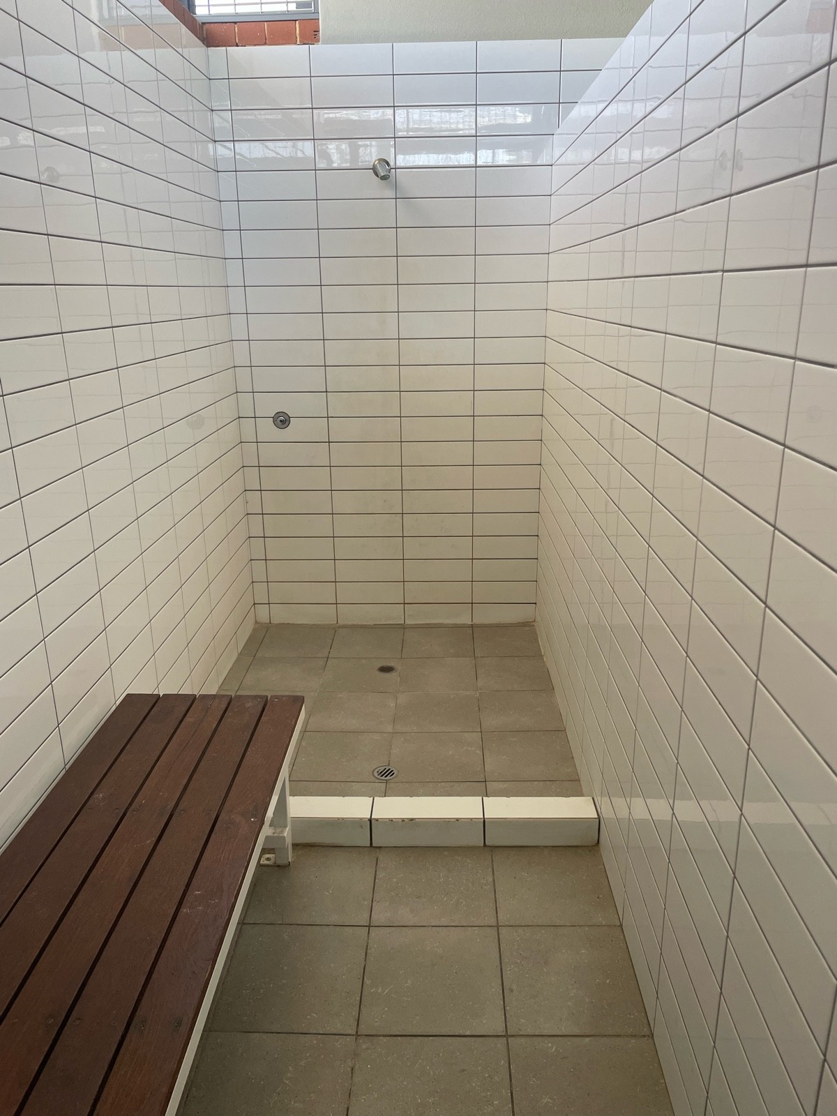 Full shower in mens toilet but there us a 15cm step up to overcome
