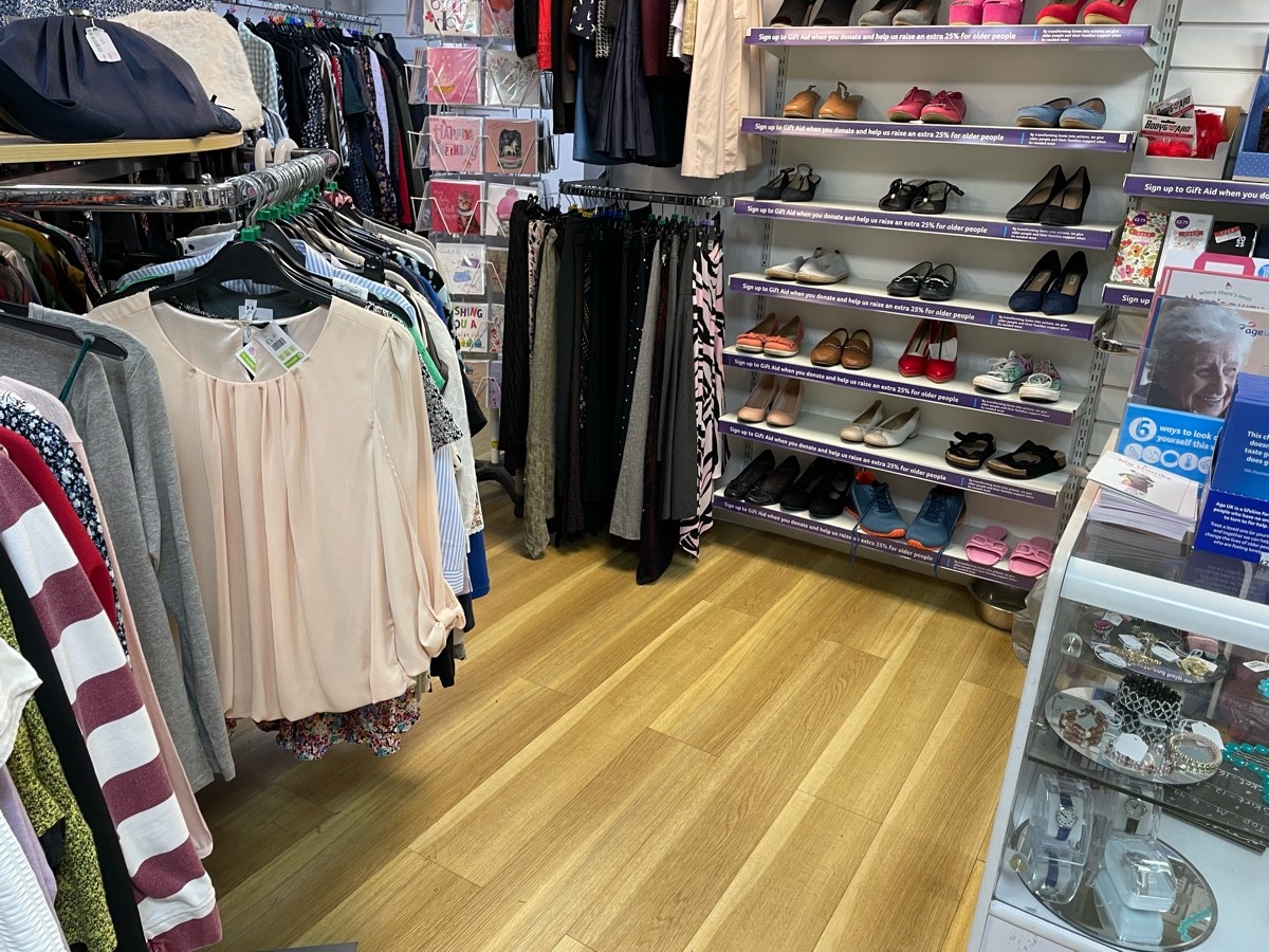 This photo is the path from the main entrance to the side of the counter. This path has the counter on your right with rails to your left