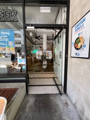 Glass door. Push from left.
