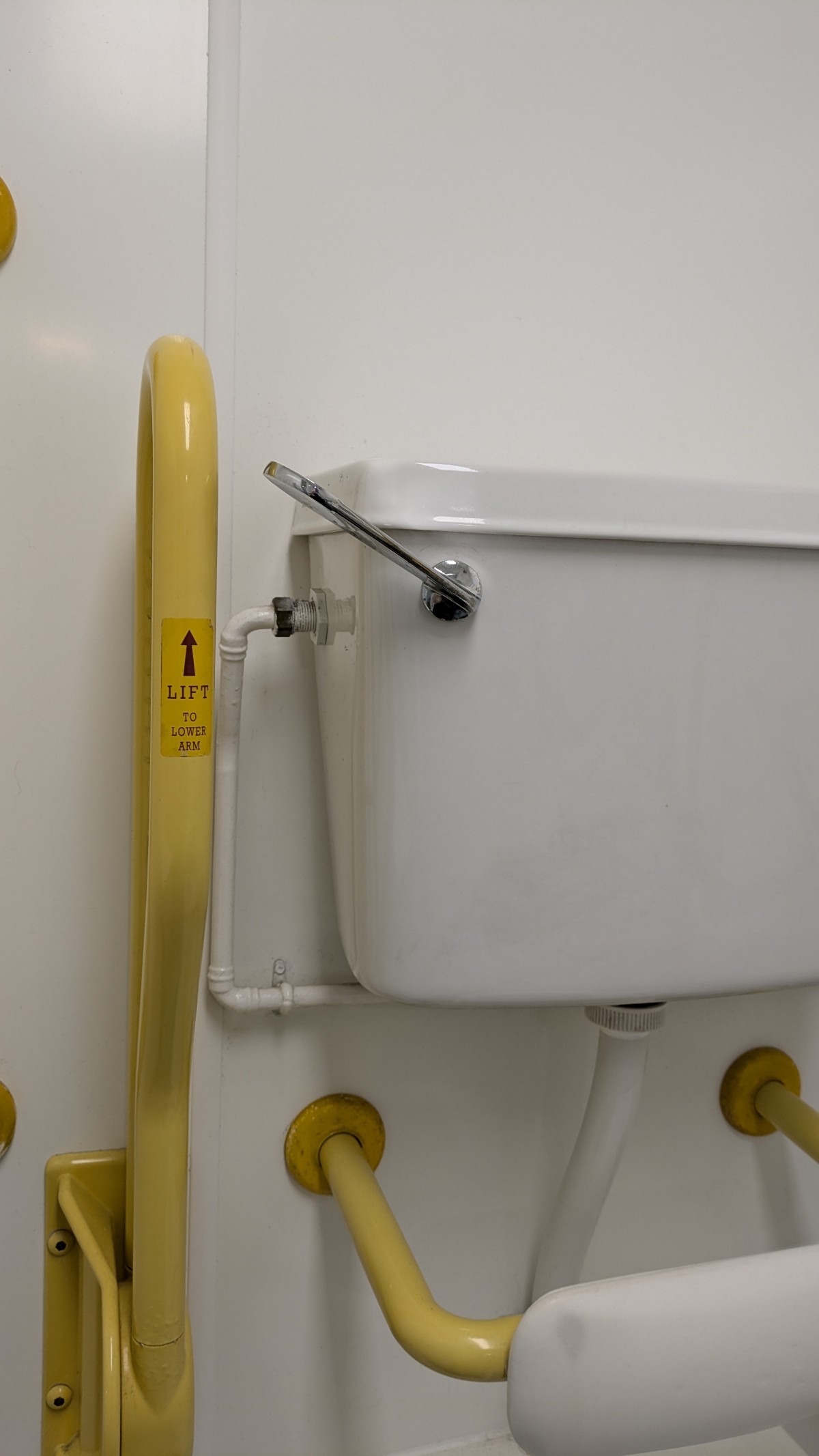 Pull-handle to flush. No sensory activated alternative, requires grip & strength and is a regular height so inaccessible to those of shorter stature