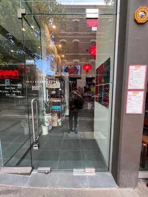 Glass door. Push from left to open.