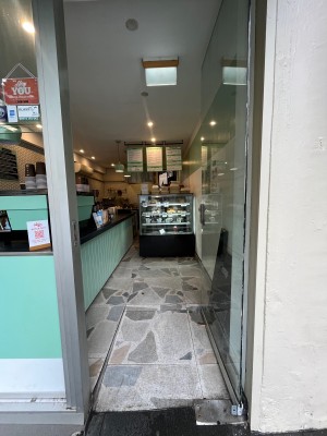 Glass door. Push from left to open.