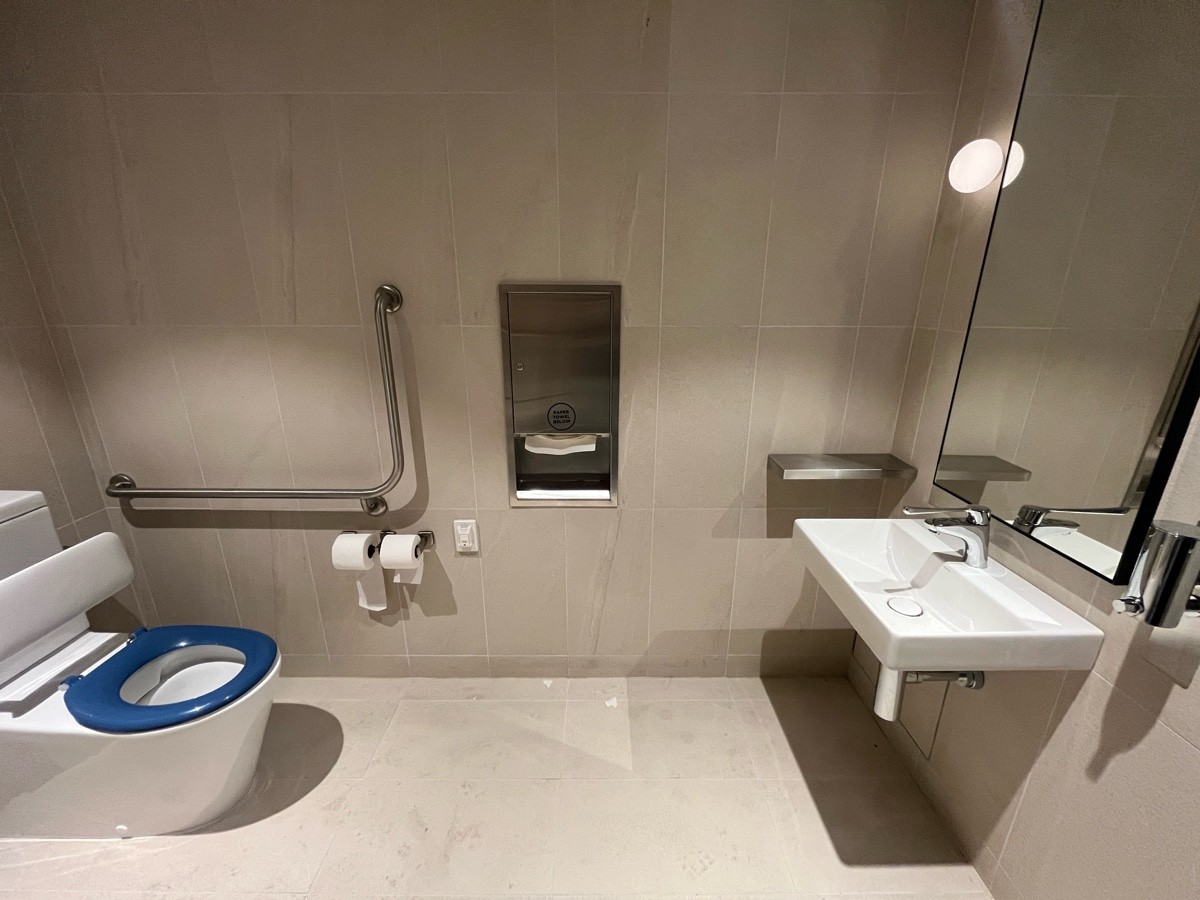 From door facing straight. Sink on right wall.