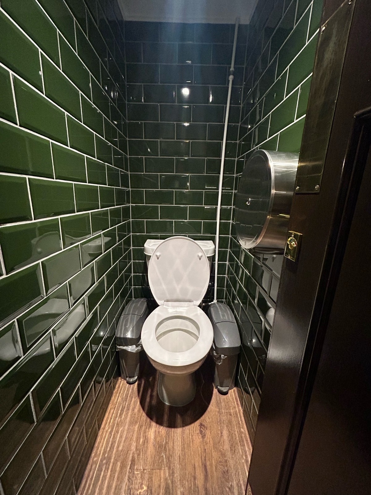 From cubicle door facing straight. Toilet at back.