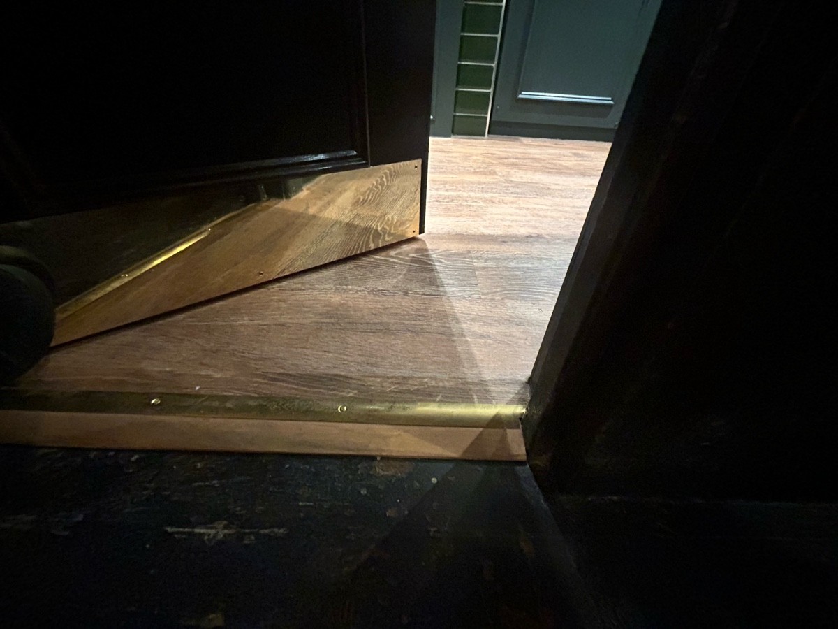 Small bump at foot of door.