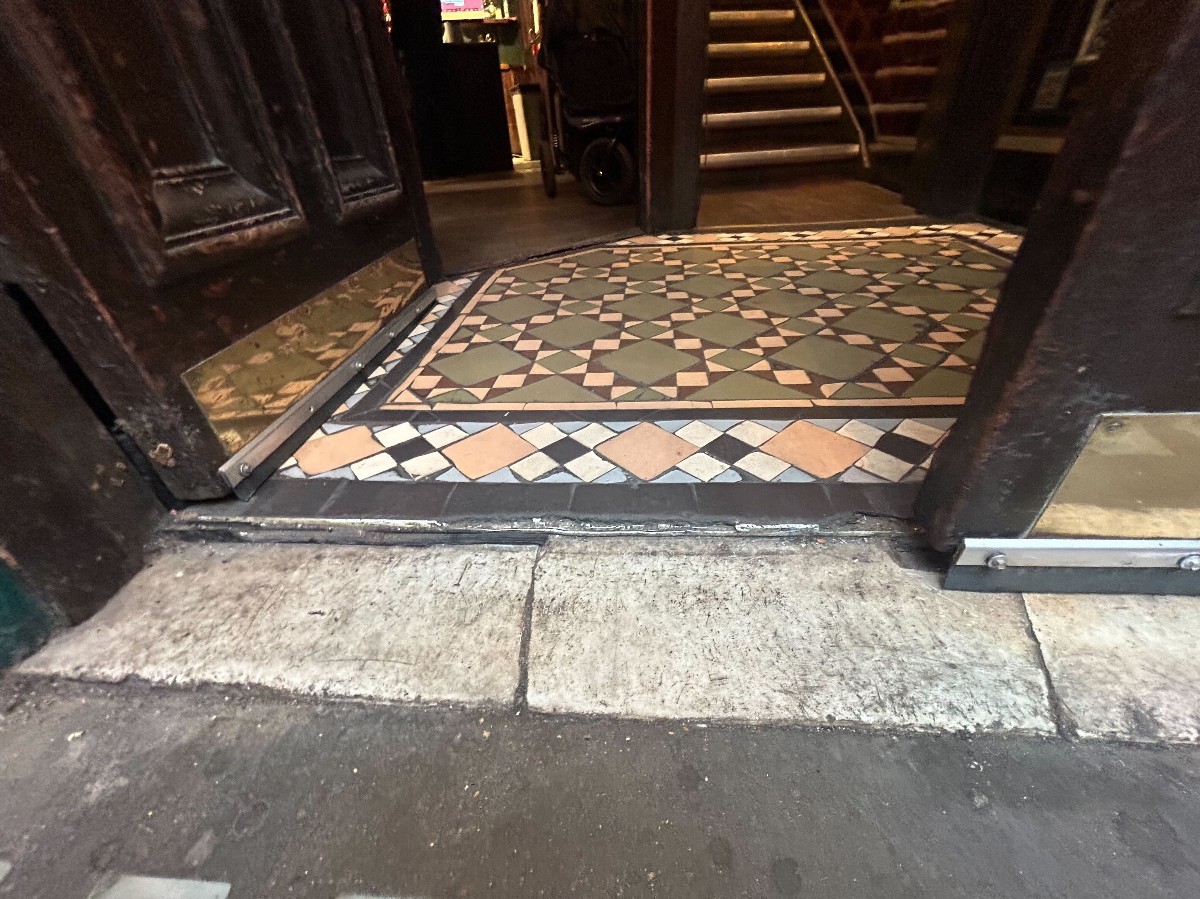 Small bump at foot of door.
