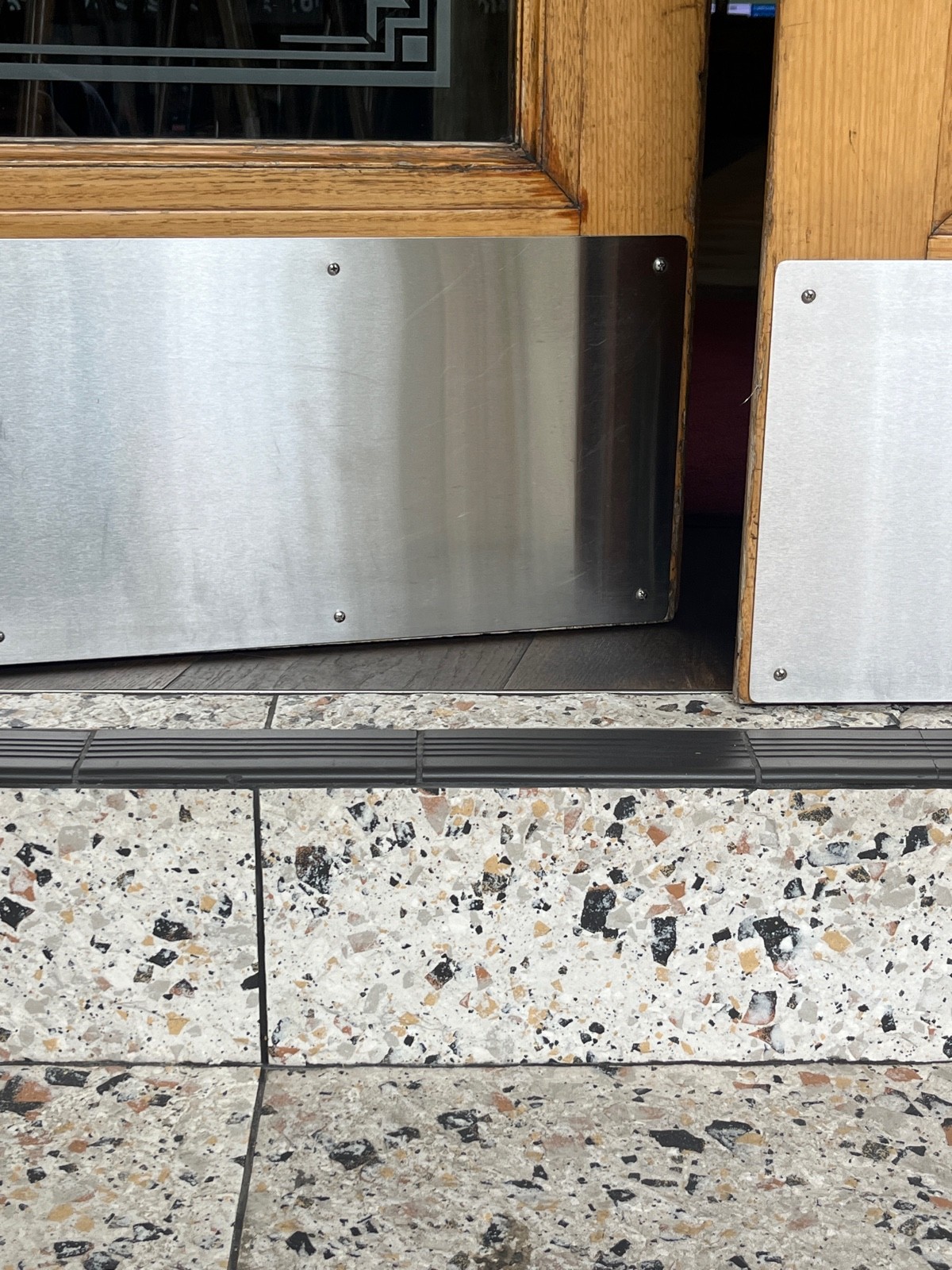 Small bump at foot of doors.