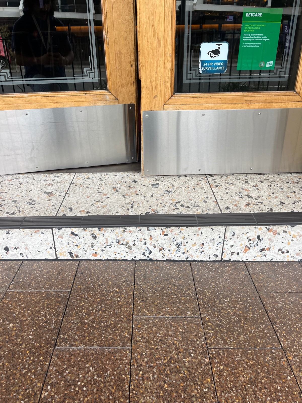 One step up through doors.