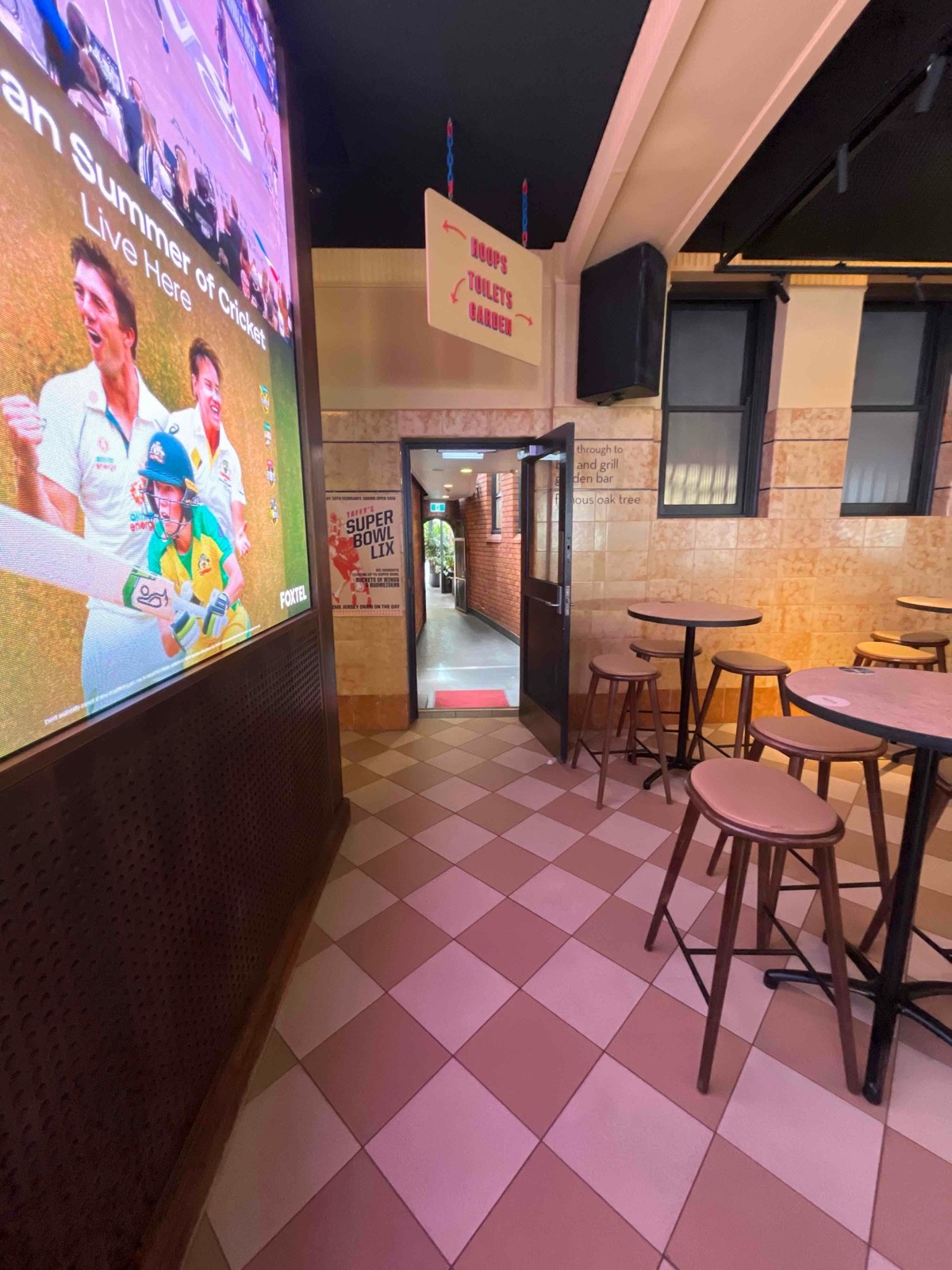 From after bar facing right. Door to connected next door venues garden directly ahead.