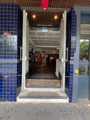Doors with grey wooden frame. Pull silver handles from middle.