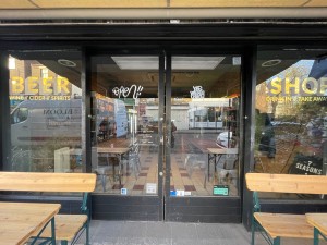 Double glass sliding doors with black frames.