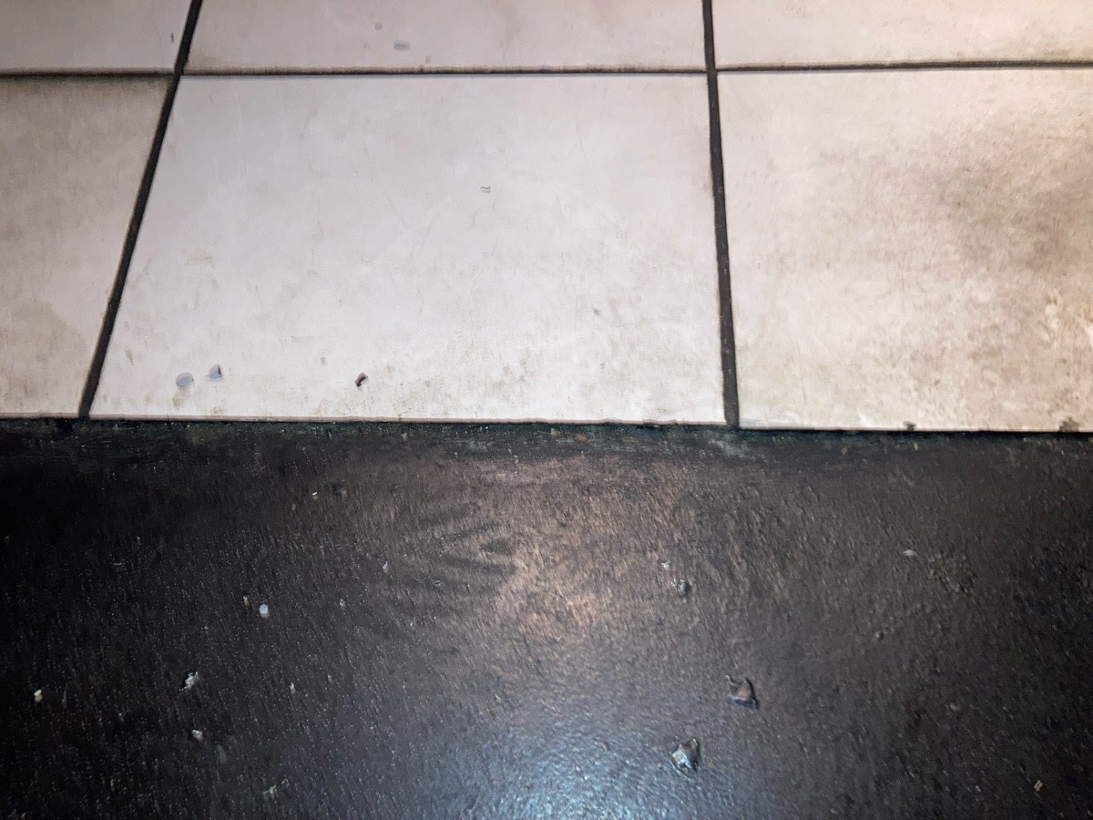 Small bump at foot of door.