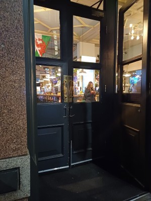 Double wooden heavy pull doors, narrow on their own, could open both though, not bolted.