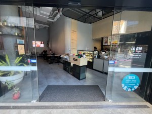 Glass double doors slide open from middle.