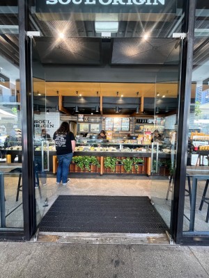 Glass double doors. Push from middle.