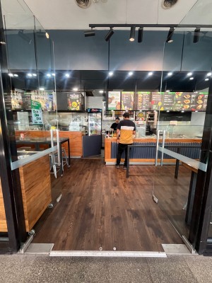 Glass double doors. Push from middle to open.