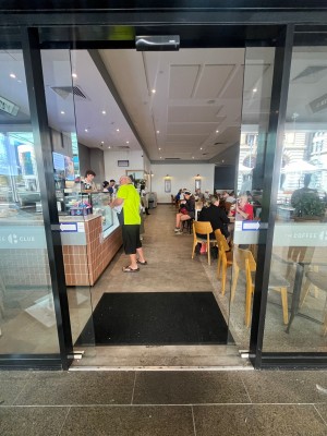 Glass doors slide open from middle.
