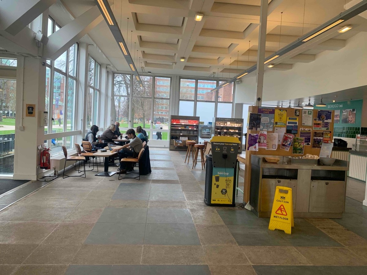 There are two main seating area in the left and right hand 
The counter is directly opposite the main entrance 
The key pathway leading to the toilet