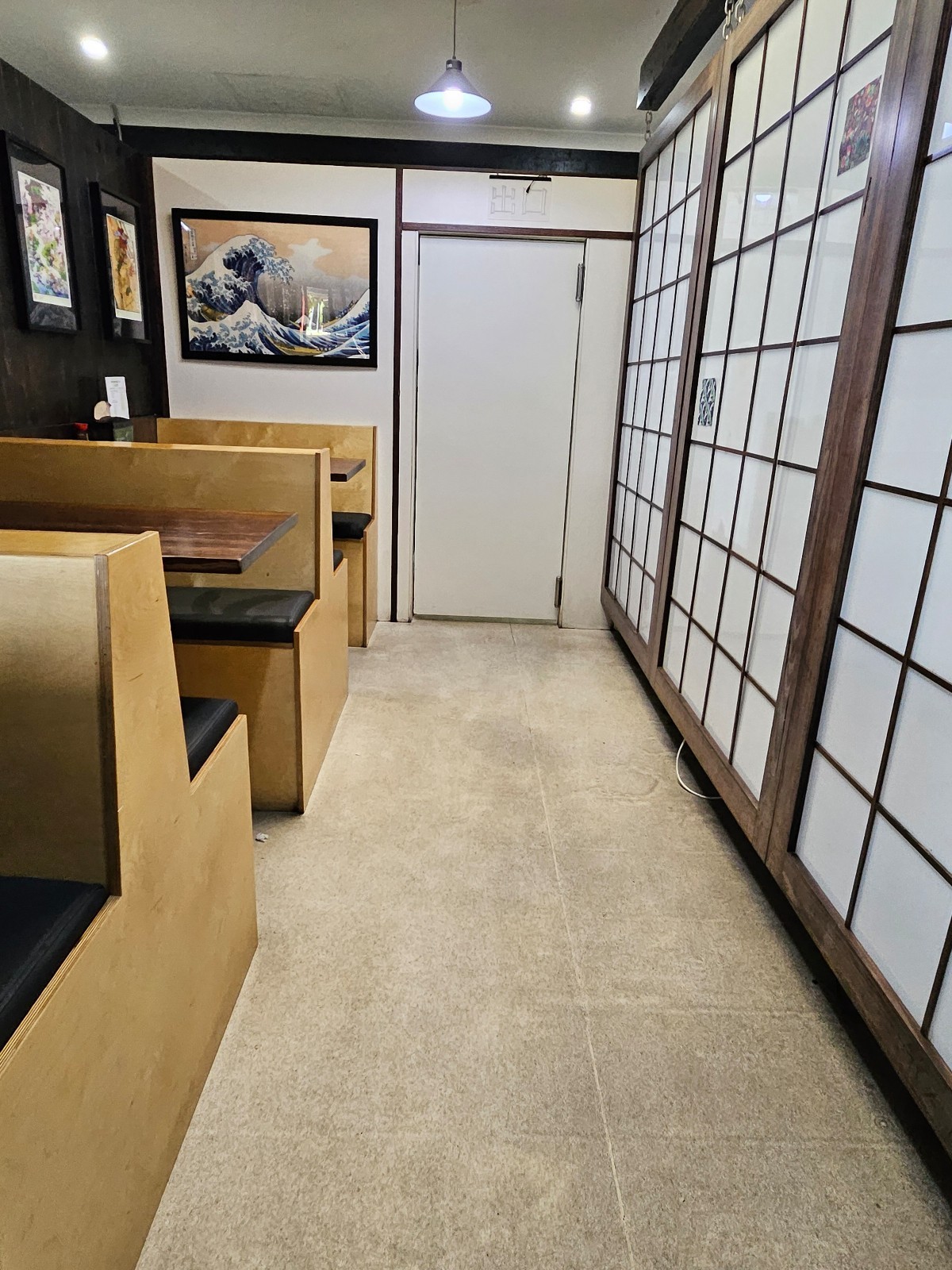 From after entrance facing straight. Booth along left wall.