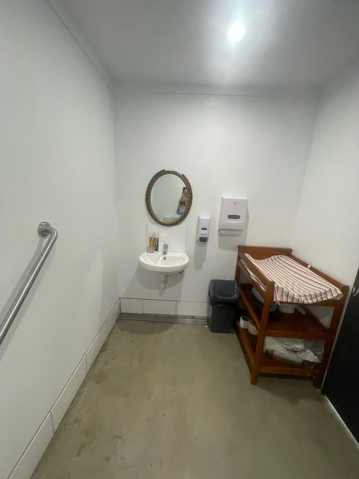 Sink to the left. Baby change to the right