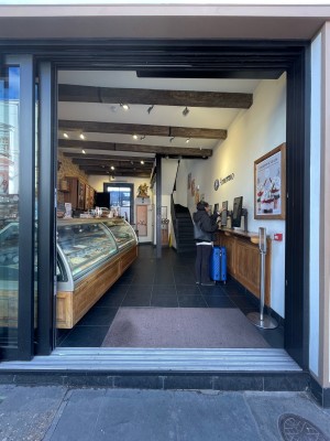 Sliding glass doors with black frame. Slide from right to left to open.